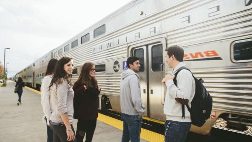 students at train station