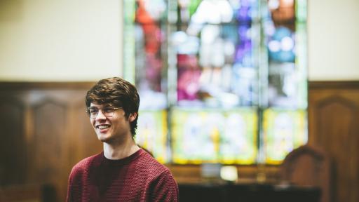 student in koten chapel